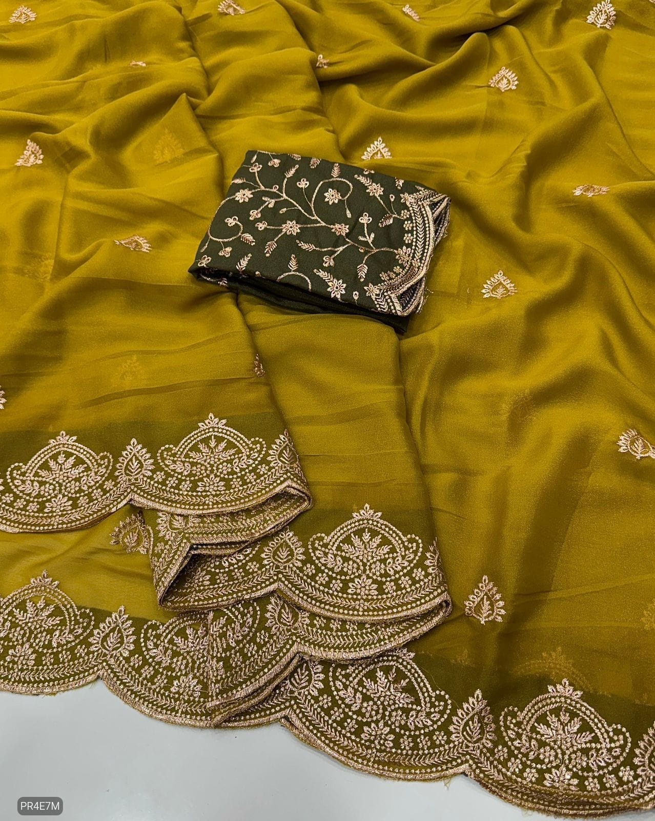 Star Georgette Saree with Embroidery Work & Contrast Blouse