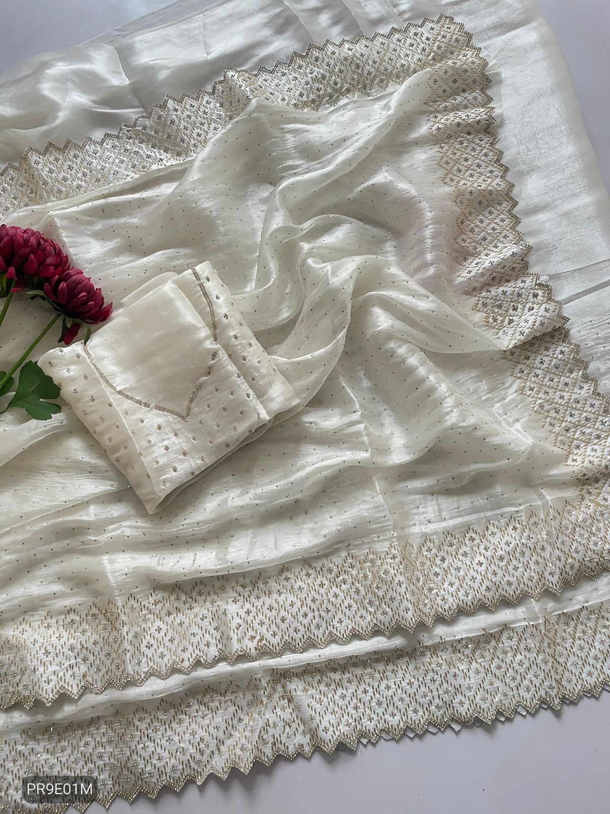 White Jimmy Choo Saree with Zarkhan & Diamond Work Blouse