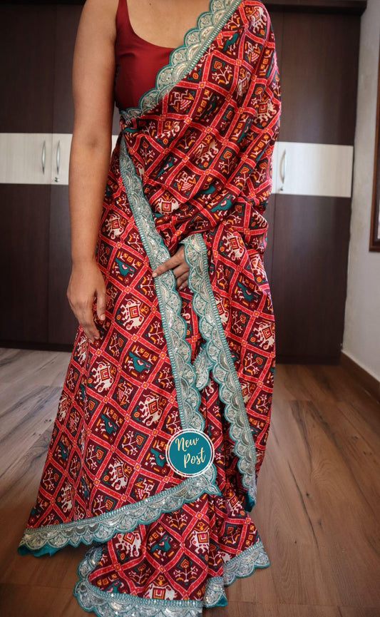 Dola Silk Saree with Digital Patola Print and Sequenced Lace Border
