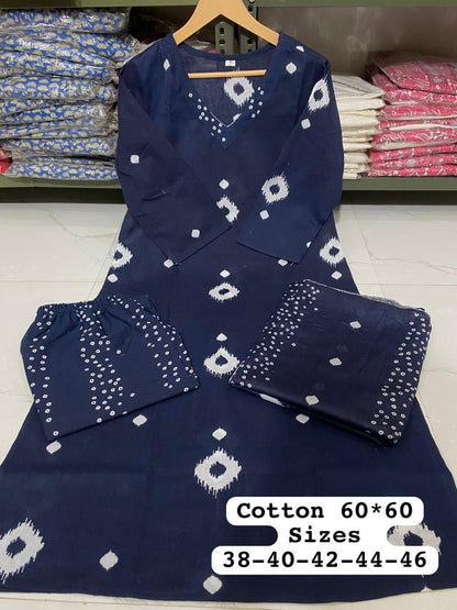 Navy blue cotton outfit with white patterns on a hanger