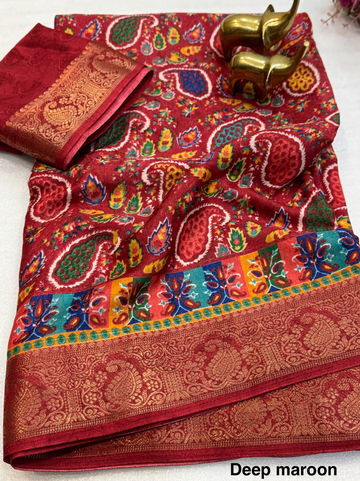 Deep Maroon Dola Jute Print Saree with Golden Weaving Border & Running Blouse