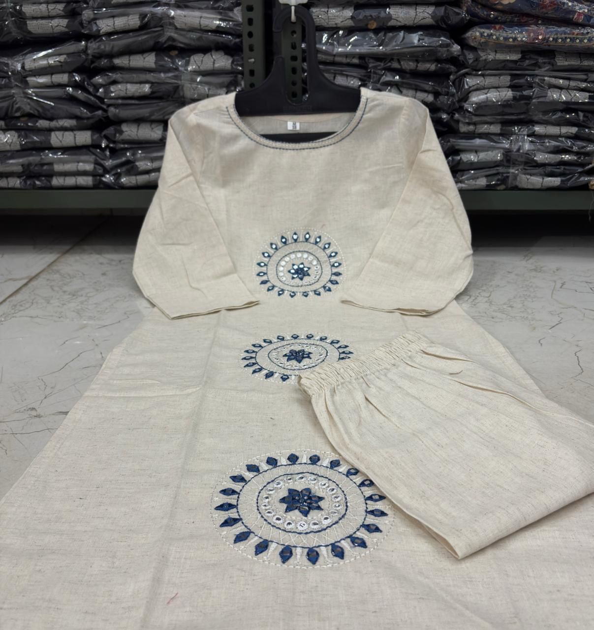Ivory Cotton Flex Kurta Set with Blue Embroidered Motifs
