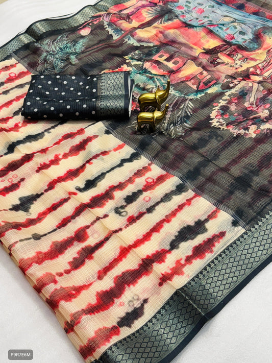 Colorful patterned fabric with a black pouch and gold bangles on a white background