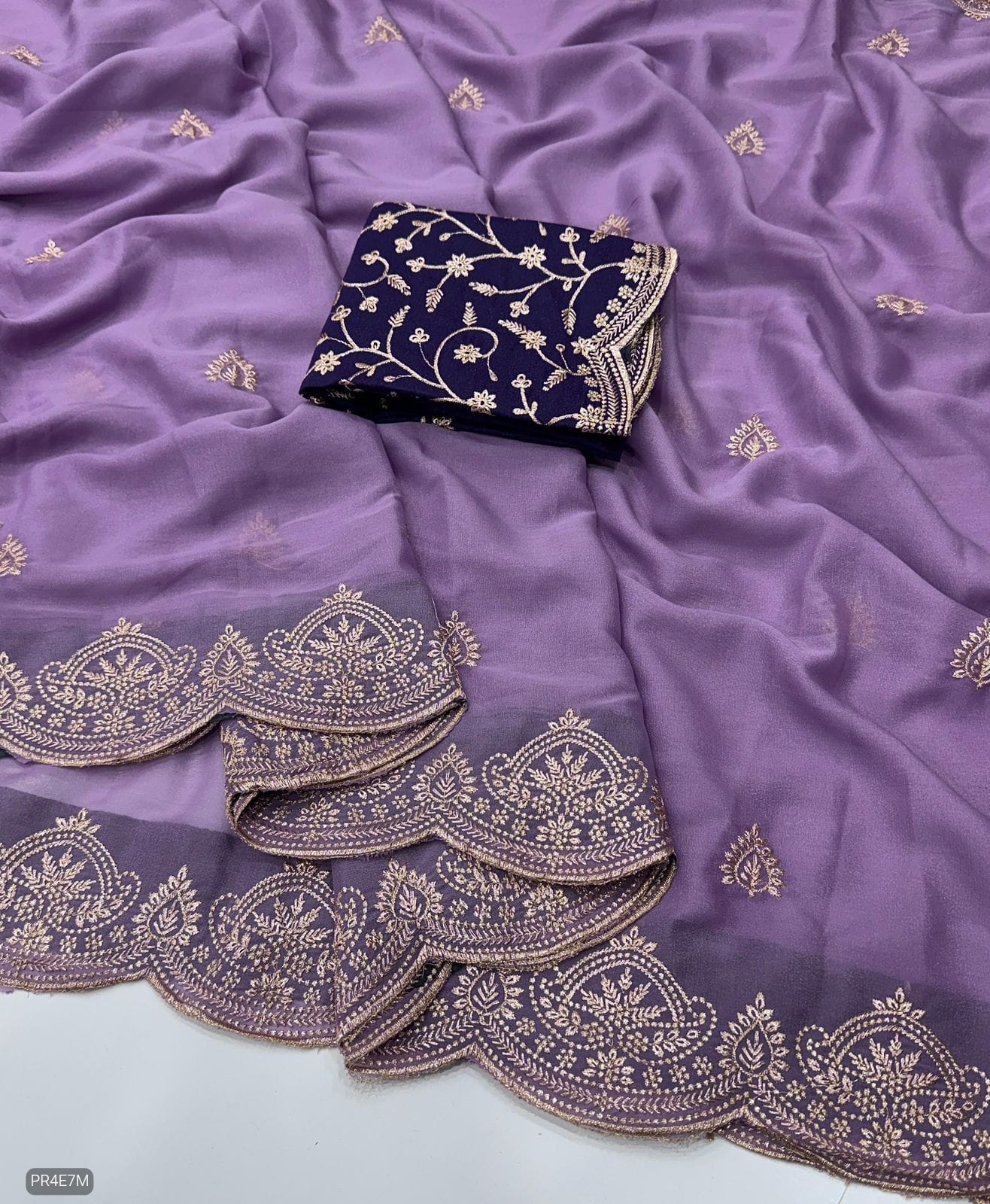 Star Georgette Saree with Embroidery Work & Contrast Blouse