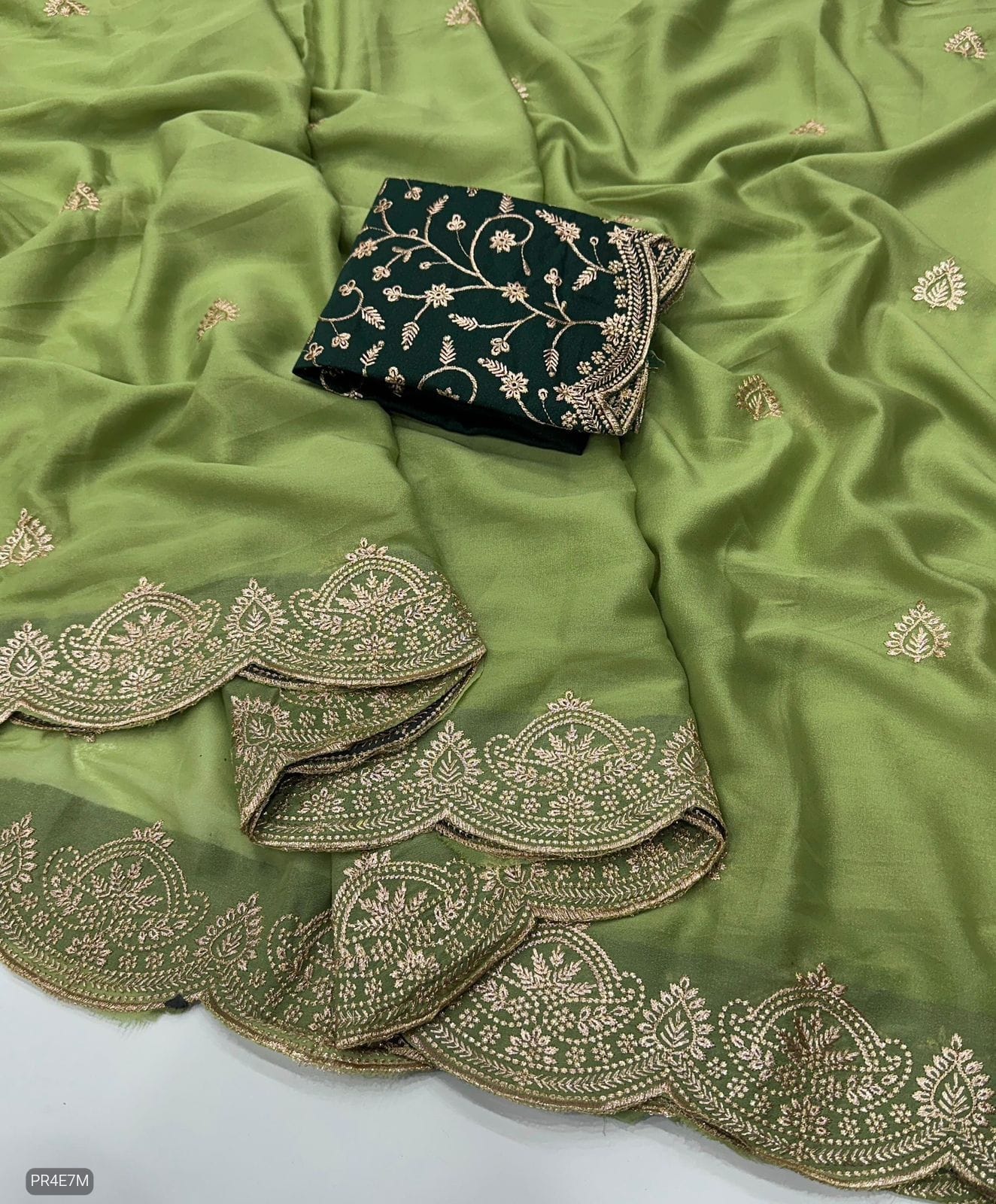 Star Georgette Saree with Embroidery Work & Contrast Blouse